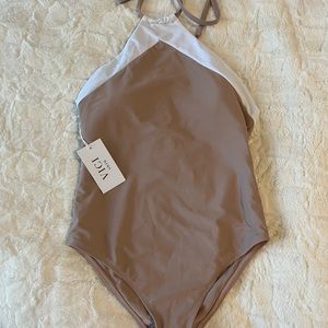 Brand new with tags, never worn Vici one piece halter top swimsuit